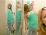 Two girl girlfriends in a changing room
